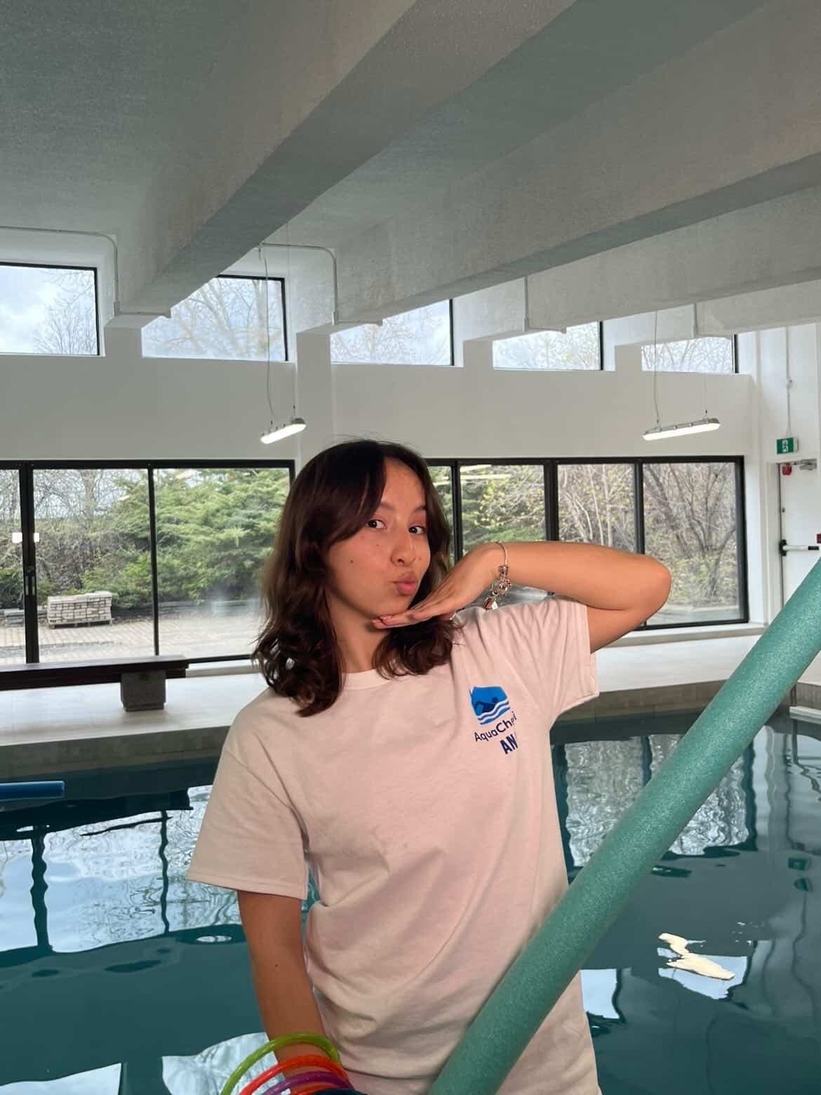 AquaChezToi team member, poolside
